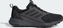 Zij-aanzicht van een zwarte Adidas Terrex trailrunningschoen met donkergrijze details.