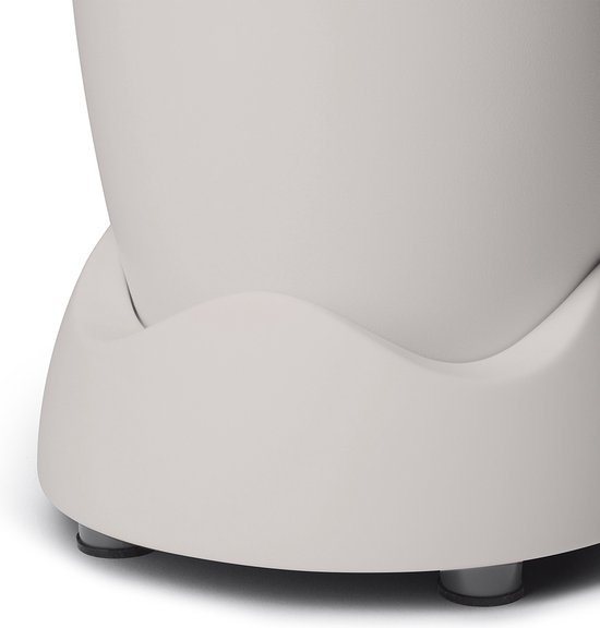 Close-up van de basis van een beige Nutribullet blender met vier grijze pootjes.