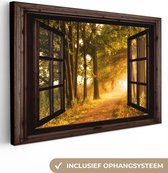 Canvas schilderij 90x60 cm - Wanddecoratie Bos - Bomen - Zonlicht - Herfst - Bospad - Natuur - Doorkijk - Muurdecoratie woonkamer - Slaapkamer decoratie - Kamer accessoires - Schilderijen