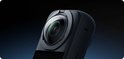 Zwarte Insta360 X3 camera met grote lens, gedetailleerde textuur.