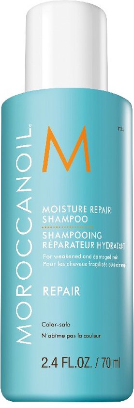 Turkooizen fles Moroccanoil Moisture Repair Shampoo met M-logo en tekst.