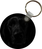 Porte-clés - un chien noir - Plastique - Rond