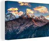 Canvas Schilderij Annapurna berg met zon op wolken, Nepal - 30x20 cm - Wanddecoratie