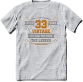 33 Jaar Legend T-Shirt | Goud - Zilver | Grappig Verjaardag Cadeau | Dames - Heren | - Licht Grijs - Gemaleerd - XL