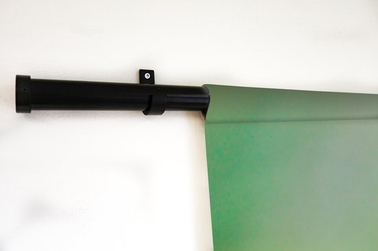 Wandkleed Sneeuwluipaard - Sneeuwluipaard die omhoog kijkt Wandkleed katoen 60x90 cm - Wandtapijt met foto