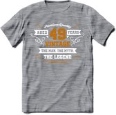 49 Jaar Legend T-Shirt | Goud - Wit | Grappig Verjaardag en Feest Cadeau Shirt | Dames - Heren - Unisex | Tshirt Kleding Kado | - Donker Grijs - Gemaleerd - S