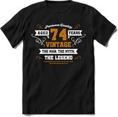 74 Jaar Legend T-Shirt | Goud - Wit | Grappig Verjaardag en Feest Cadeau Shirt | Dames - Heren - Unisex | Tshirt Kleding Kado | - Zwart - M