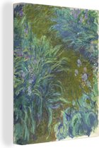 Canvas Schilderij Het pad door de irissen - Schilderij van Claude Monet - 90x120 cm - Wanddecoratie