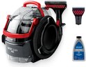 BISSELL SpotClean Pro met accessoires: reiniger, opzetstuk en flesje.