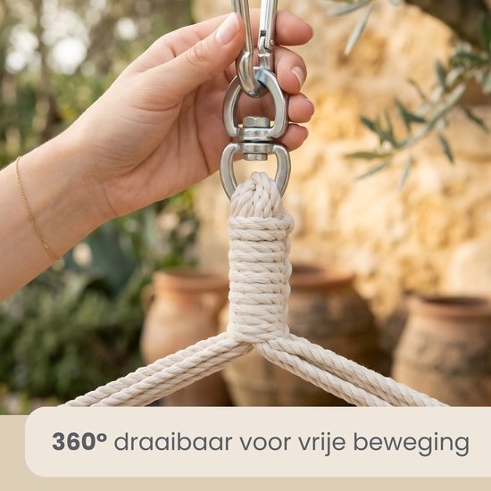 Metalen draaibare bevestiging aan een katoenen touw.
