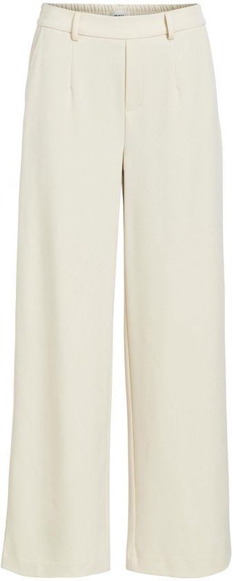 Lichtbeige wijde pantalon, studiofoto.