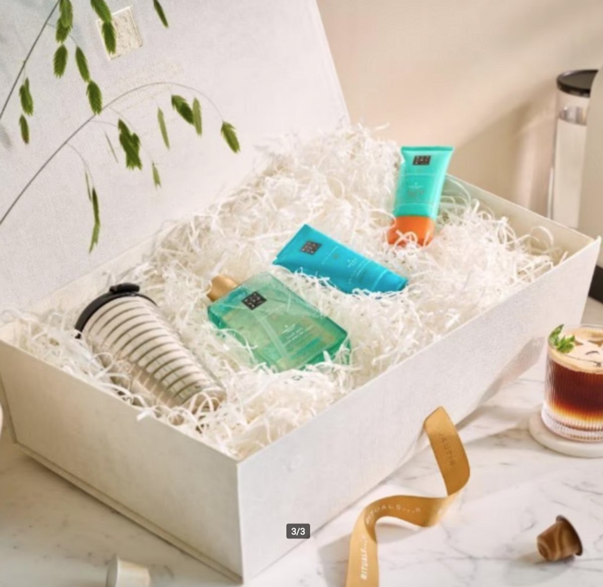 Nespresso & Rituals Copack inclusief 1x Nespresso Touch Travelmug 345ml, 1x Rituals Karma Sun Face Cream SPF 50, 1x Body Cream, 1x Hand Wash