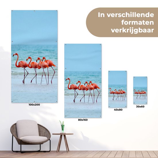 Affiche de jardin Quatre flamants roses marchant dans l'eau - 30x60 cm