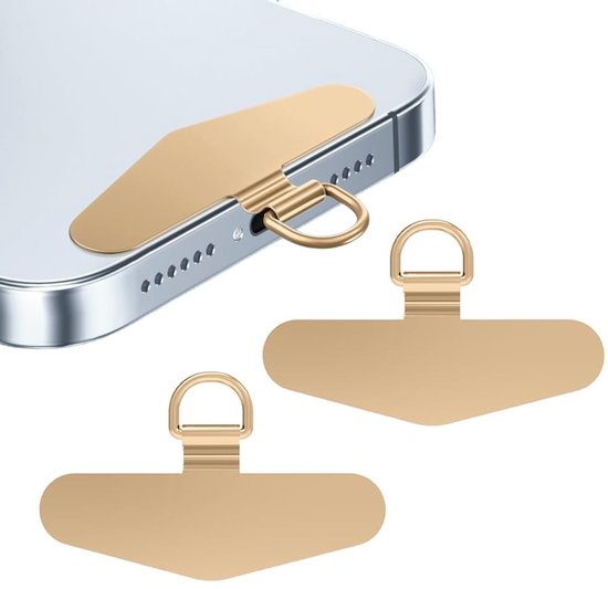 Patch de téléphone doré avec œillet pour chaîne de téléphone, à côté d'un smartphone.