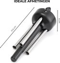 Zwarte houder van een instrumentenstandaard met zilveren poten. Afmetingen: 17.5cm lang, 6cm hoog.