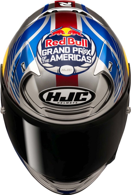 Zilverkleurige integraalhelm met Red Bull Grand Prix of the Americas-logo en Union Jack-ontwerp.