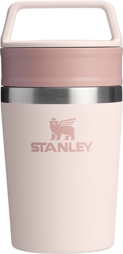 Roze Stanley beker met handvat en deksel, met het Stanley logo erop.