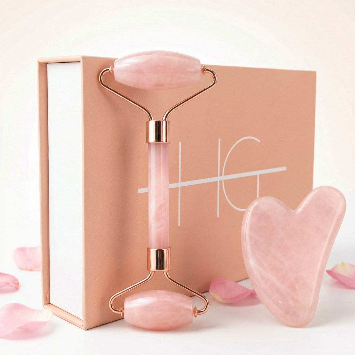Logo van HG Aesthetics Jade Roller met Gua Sha Steen - Gezichtsroller - Face Roller voor Gezichtsmassage & Huidverzorging - 100% Natuurlijke Jade - Anti-Aging & Rimpelvermindering - Ontspanning & Doorbloeding - Roze - cadeautje vrouw -Perfect Moederdag cadeau