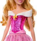 Close-up van het bovenlichaam van Prinses Aurora pop. Ze draagt een roze jurk met details en een gouden tiara.