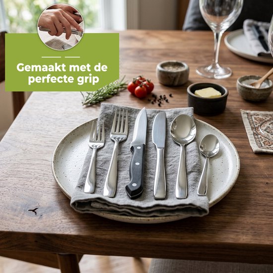 Zilveren bestek op een bord met een grijs linnen servet. "Gemaakt met de perfecte grip" wordt getoond.