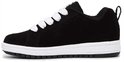 Zwarte DC Shoes sneaker met witte veters en een witte zool.