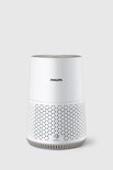 Philips luchtreiniger in het wit met gedetailleerd patroon op de onderkant.