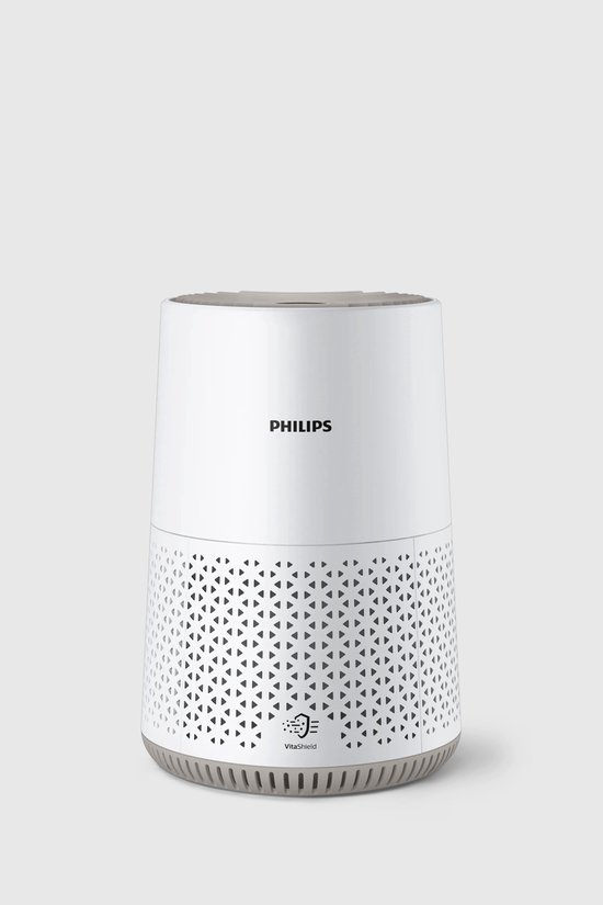 Philips luchtreiniger in het wit met gedetailleerd patroon op de onderkant.