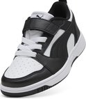 Zwart-witte PUMA sneaker met klittenbandsluiting, witte veters en perforaties op de neus.