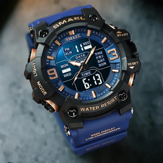 Smael herenhorloge met blauwe wijzerplaat en koperkleurige accenten. Blauwe rubberen band. Water resist.