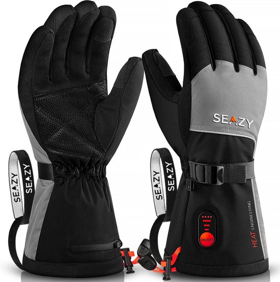 Paar zwarte en grijze verwarmde handschoenen met "SEAZY" logo, verstelbare band en "HEAT ENGINEERING" tekst.