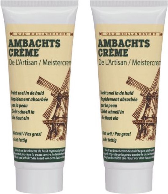 Twee tubes met "OUD HOLLANDSCHE AMBACHTS CRÈME" in crèmekleurige verpakking met afbeelding van een molen.