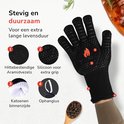 Zwarte handschoenen met hittebestendige aramidevezels, siliconen grip en katoenen voering.