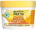 Masque capillaire nourrissant Garnier Fructis Hair Food banane, 98% d'ingrédients d'origine naturelle.