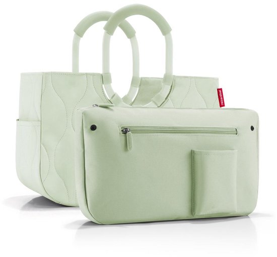 Lichtgroene shopper met verticale quiltrand en bijpassende binnentas met rits en vakje.