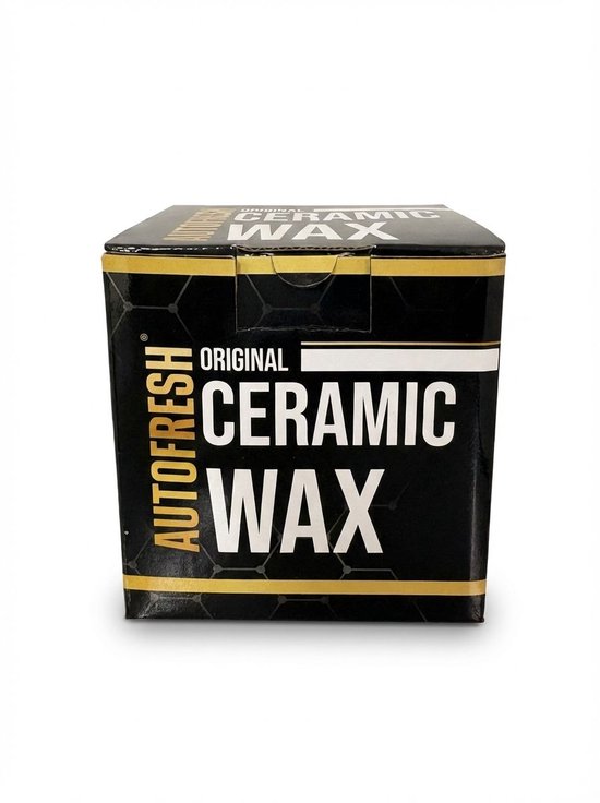 Zwarte Autofresh keramische wax doos met gouden en witte details.