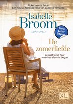 Een vrouw met strooien hoed zit op een stoel aan het water. Boek "De zomerliefde" van Isabelle Broom.