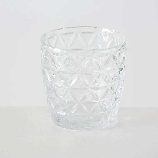 Glazen waxinelichthouder met een geometrisch ruitpatroon.