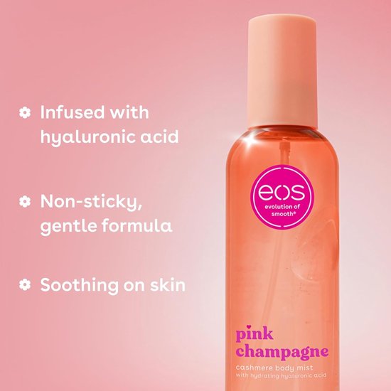 Roze body mist van eos in glazen fles met oranje dop. Tekst: 'pink champagne cashmere body mist with hydrating hyaluronic acid'.