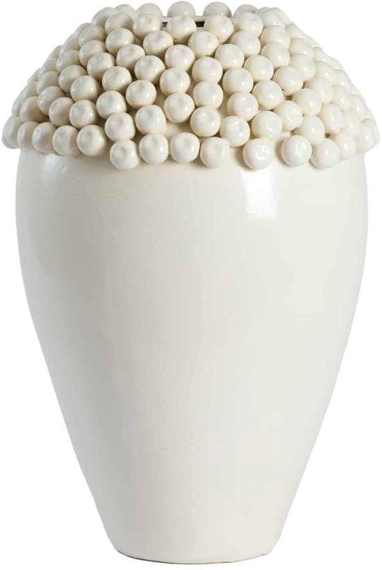 Vase en céramique crème avec une décoration sphérique sur le dessus.