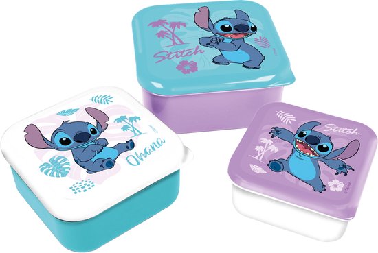 Trois boîtes à snacks violettes, bleues et blanches avec Stitch sur les couvercles, des feuilles tropicales et des fleurs.