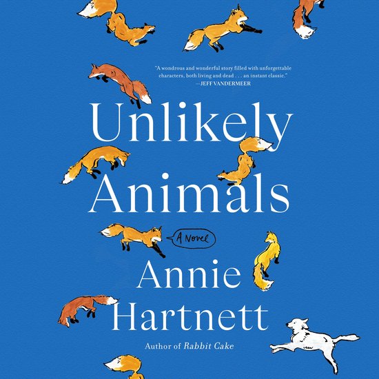 Livre sur fond bleu, avec des illustrations de renards et d'un chien, titre "Unlikely Animals" par Annie Hartnett.