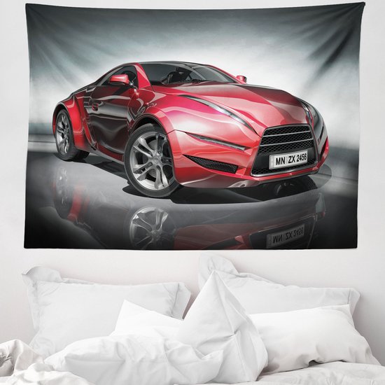 Voiture de sport rouge brillante avec jantes argentées, présentée sur une surface réfléchissante.