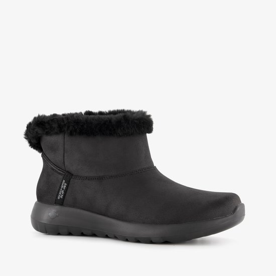 Zwarte dameslaars met bontkraag en SKECHERS slip-ins logo.