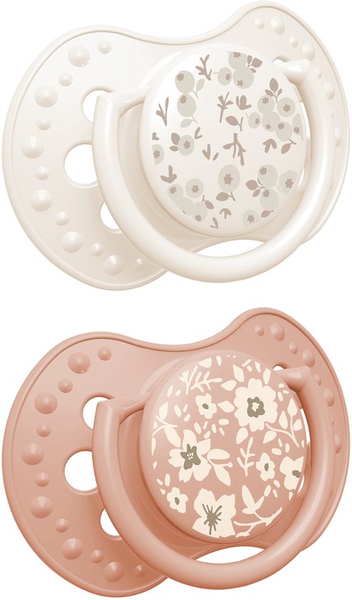 Twee Difrax LOVI fopspenen met bloemenprint: één wit en één koraal.