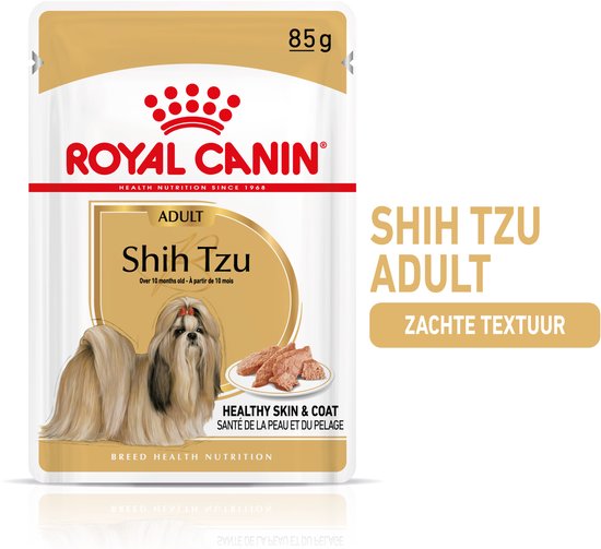 Royal Canin Shih Tzu Adult natvoer 85g met afbeelding van een Shih Tzu hond, goudkleurige verpakking, met de tekst 'HEALTHY SKIN & COAT'.