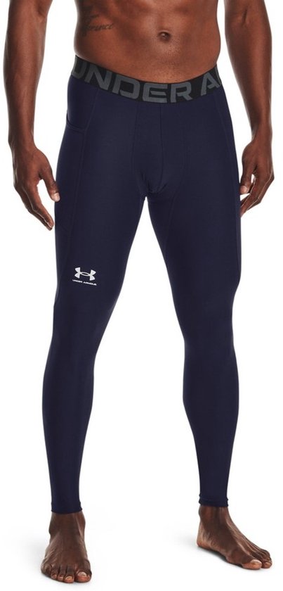 Donkerblauwe Under Armour legging met grijze Under Armour band en logo.
