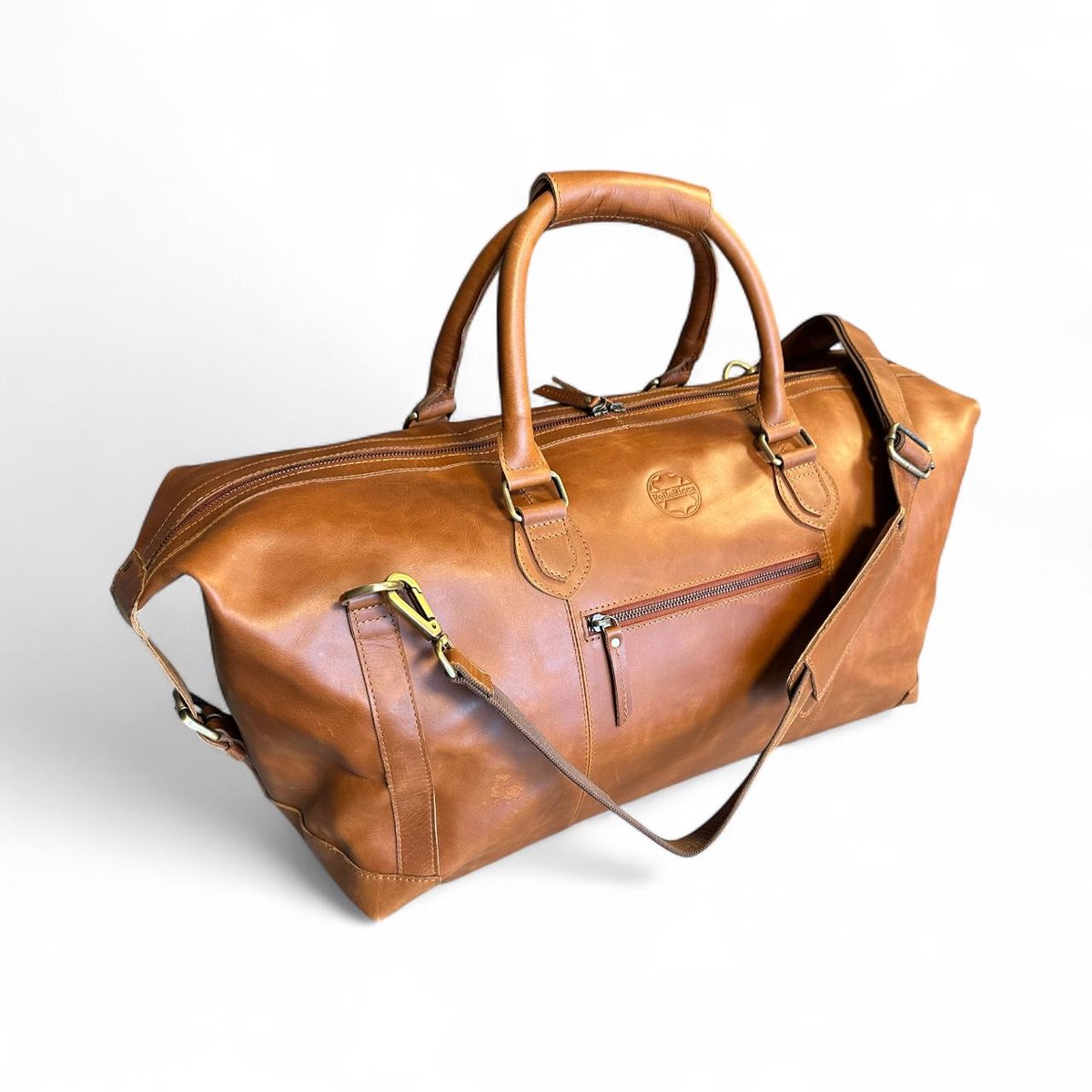 Lederen tas - reistas - kalfsleer tas - duffle bag leather - leren reistas - luxe lederen reistas - grote leren reistas - cognac leer tas - cognac kleur - grote lederen reistas - weekend tas - vakantie tas - Genuine Leather bag -