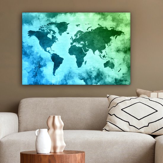Wereldkaart avec peinture bleue qui passe au vert sur fond avec motif texturé 60x40 cm