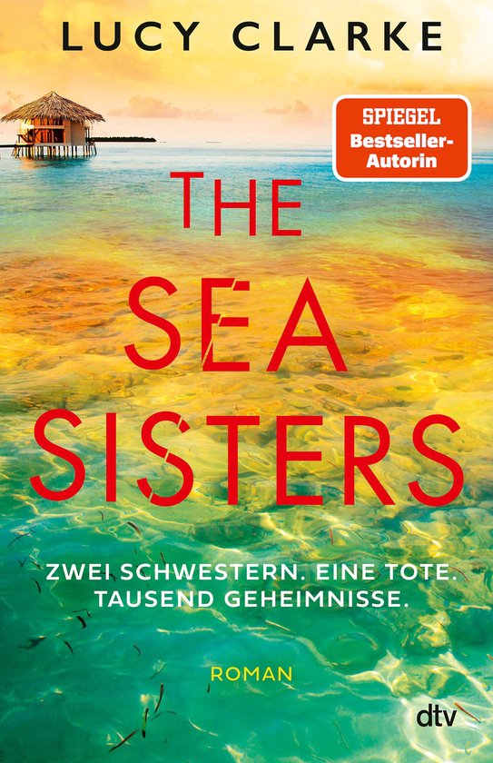Boekcover met de titel 'The Sea Sisters' van Lucy Clarke. Op de cover staat een hutje op palen in de zee met veelkleurig water.