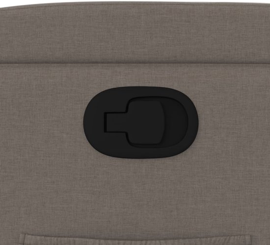 Grijze fauteuil met zwarte hendel voor verstelling.
